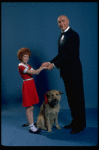 Allison Smith as Annie and Harve Presnell as Daddy Warbucks w. Sandy in a scene from the Broadway production of the musical "Annie." (New York)