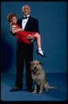 Allison Smith as Annie and Harve Presnell as Daddy Warbucks w. Sandy in a scene from the Broadway production of the musical "Annie." (New York)