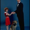 Allison Smith as Annie and Harve Presnell as Daddy Warbucks w. Sandy in a scene from the Broadway production of the musical "Annie." (New York)