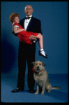 Allison Smith as Annie and Harve Presnell as Daddy Warbucks w. Sandy in a scene from the Broadway production of the musical "Annie." (New York)