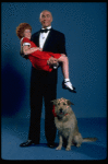 Allison Smith as Annie and Harve Presnell as Daddy Warbucks w. Sandy in a scene from the Broadway production of the musical "Annie." (New York)