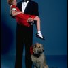 Allison Smith as Annie and Harve Presnell as Daddy Warbucks w. Sandy in a scene from the Broadway production of the musical "Annie." (New York)