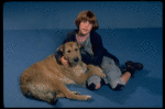 Mollie Hall as Annie w. Sandy in a scene from a touring company of the musical "Annie."