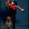 Mollie Hall as Annie and Ron Holgate as Daddy Warbucks w. Sandy in a scene from a touring company of the musical "Annie."