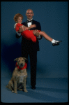 Mollie Hall as Annie and Ron Holgate as Daddy Warbucks w. Sandy in a scene from a touring company of the musical "Annie."