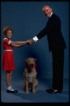 Mollie Hall as Annie and Ron Holgate as Daddy Warbucks w. Sandy in a scene from a touring company of the musical "Annie."