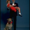 Mollie Hall as Annie and Ron Holgate as Daddy Warbucks w. Sandy in a scene from a touring company of the musical "Annie."