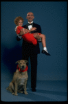 Mollie Hall as Annie and Ron Holgate as Daddy Warbucks w. Sandy in a scene from a touring company of the musical "Annie."