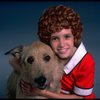 Alyson Kirk as Annie w. Sandy in a scene from the Broadway company of the musical "Annie."