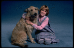 Alyson Kirk as Annie w. Sandy in a scene from the Broadway company of the musical "Annie"