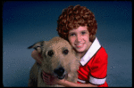 Alyson Kirk as Annie w. Sandy in a scene from the Broadway company of the musical "Annie."