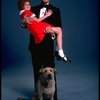 Harve Presnell as Daddy Warbucks and Alyson Kirk as Annie w. Sandy in a scene from the Broadway company of the musical "Annie."