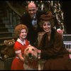 Kathleen Sisk as Annie, Gary Holcombe as Daddy Warbucks and Ruth Williamson as Miss Hannigan w. Sandy fr. touring company of musical "Annie." (Atlanta)