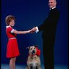 Kathleen Sisk as Annie and Gary Holcombe as Daddy Warbucks w. Sandy in a scene from a touring company of the musical "Annie." (Atlanta)