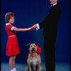 Kathleen Sisk as Annie and Gary Holcombe as Daddy Warbucks w. Sandy in a scene from a touring company of the musical "Annie." (Atlanta)