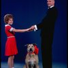 Kathleen Sisk as Annie and Gary Holcombe as Daddy Warbucks w. Sandy in a scene from a touring company of the musical "Annie." (Atlanta)