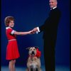 Kathleen Sisk as Annie and Gary Holcombe as Daddy Warbucks w. Sandy in a scene from a touring company of the musical "Annie." (Atlanta)