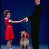 Kathleen Sisk as Annie and Gary Holcombe as Daddy Warbucks w. Sandy in a scene from a touring company of the musical "Annie." (Atlanta)