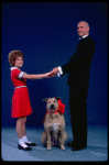 Kathleen Sisk as Annie and Gary Holcombe as Daddy Warbucks w. Sandy in a scene from a touring company of the musical "Annie." (Atlanta)