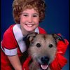 Kathleen Sisk as Annie w. Sandy in a scene from a touring company of the musical "Annie." (Atlanta)