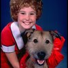 Kathleen Sisk as Annie w. Sandy in a scene from a touring company of the musical "Annie." (Atlanta)