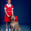 Kathleen Sisk as Annie w. Sandy in a scene from a touring company of the musical "Annie." (Atlanta)