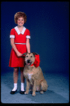 Kathleen Sisk as Annie w. Sandy in a scene from a touring company of the musical "Annie." (Atlanta)