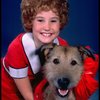 Kathleen Sisk as Annie w. Sandy in a scene from a touring company of the musical "Annie." (Atlanta)