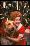 Kathleen Sisk as Annie w. Sandy in a scene from a touring company of the musical "Annie." (Atlanta)