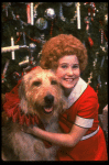 Kathleen Sisk as Annie w. Sandy in a scene from a touring company of the musical "Annie." (Atlanta)