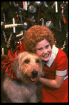 Kathleen Sisk as Annie w. Sandy in a scene from a touring company of the musical "Annie." (Atlanta)