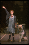 Kathleen Sisk as Annie w. Sandy in a scene from a touring company of the musical "Annie." (Atlanta)