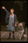 Kathleen Sisk as Annie w. Sandy in a scene from a touring company of the musical "Annie." (Atlanta)