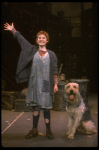 Kathleen Sisk as Annie w. Sandy in a scene from a touring company of the musical "Annie." (Atlanta)