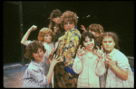 Marcia Lewis as Miss Hannigan w. orphans in a scene from a touring company of the musical "Annie." (Westbury)