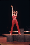 Actress Liza Minnelli in a red-sequined pant suit designed by Halston in a scene from the Broadway production of the musical "The Act." (New York)
