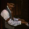 Musical director J. Leonard Oxley at the piano in a scene from the Broadway production of the musical "Ain't Misbehavin'." (New York)