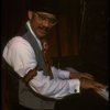Musical director J. Leonard Oxley at the piano in a scene from the Broadway production of the musical "Ain't Misbehavin'." (New York)