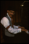 Musical director J. Leonard Oxley at the piano in a scene from the Broadway production of the musical "Ain't Misbehavin'." (New York)
