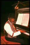 Musical director Luther Henderson at the piano in a scene from the Broadway revival of the musical "Ain't Misbehavin'." (New York)