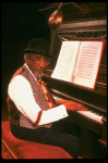 Musical director Luther Henderson at the piano in a scene from the Broadway revival of the musical "Ain't Misbehavin'." (New York)