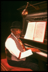 Musical director Luther Henderson at the piano in a scene from the Broadway revival of the musical "Ain't Misbehavin'." (New York)