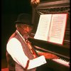 Musical director Luther Henderson at the piano in a scene from the Broadway revival of the musical "Ain't Misbehavin'." (New York)