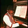 Musical director Luther Henderson at the piano in a scene from the Broadway revival of the musical "Ain't Misbehavin'." (New York)