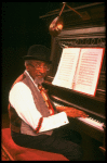 Musical director Luther Henderson at the piano in a scene from the Broadway revival of the musical "Ain't Misbehavin'." (New York)