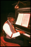 Musical director Luther Henderson at the piano in a scene from the Broadway revival of the musical "Ain't Misbehavin'." (New York)