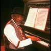 Musical director Luther Henderson at the piano in a scene from the Broadway revival of the musical "Ain't Misbehavin'." (New York)