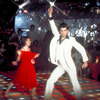 Actor John Travolta disco dancing with actress Karen Gorney in scene from the film "Saturday Night Fever"