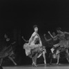 Actress Chita Rivera dancing with female chorus members in musical "West Side Story".