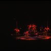 Dancers performing on circular stage with poles in a scene from the Broadway production of the musical "The Act." (New York)